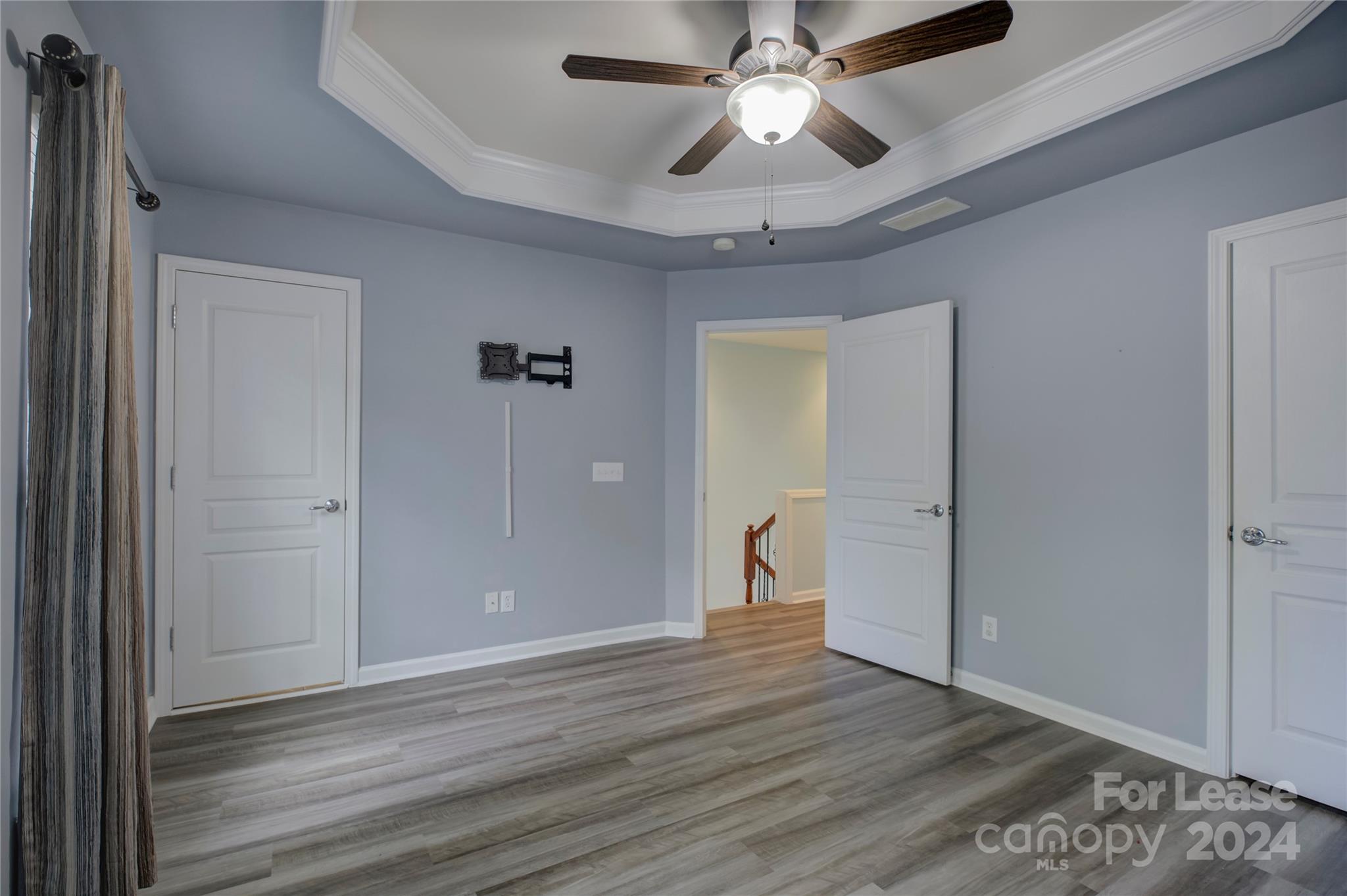 568 6th Baxter Crossing Fort Mill, SC 29708 - Photo 28 of 48 a view of an empty room and wooden floor