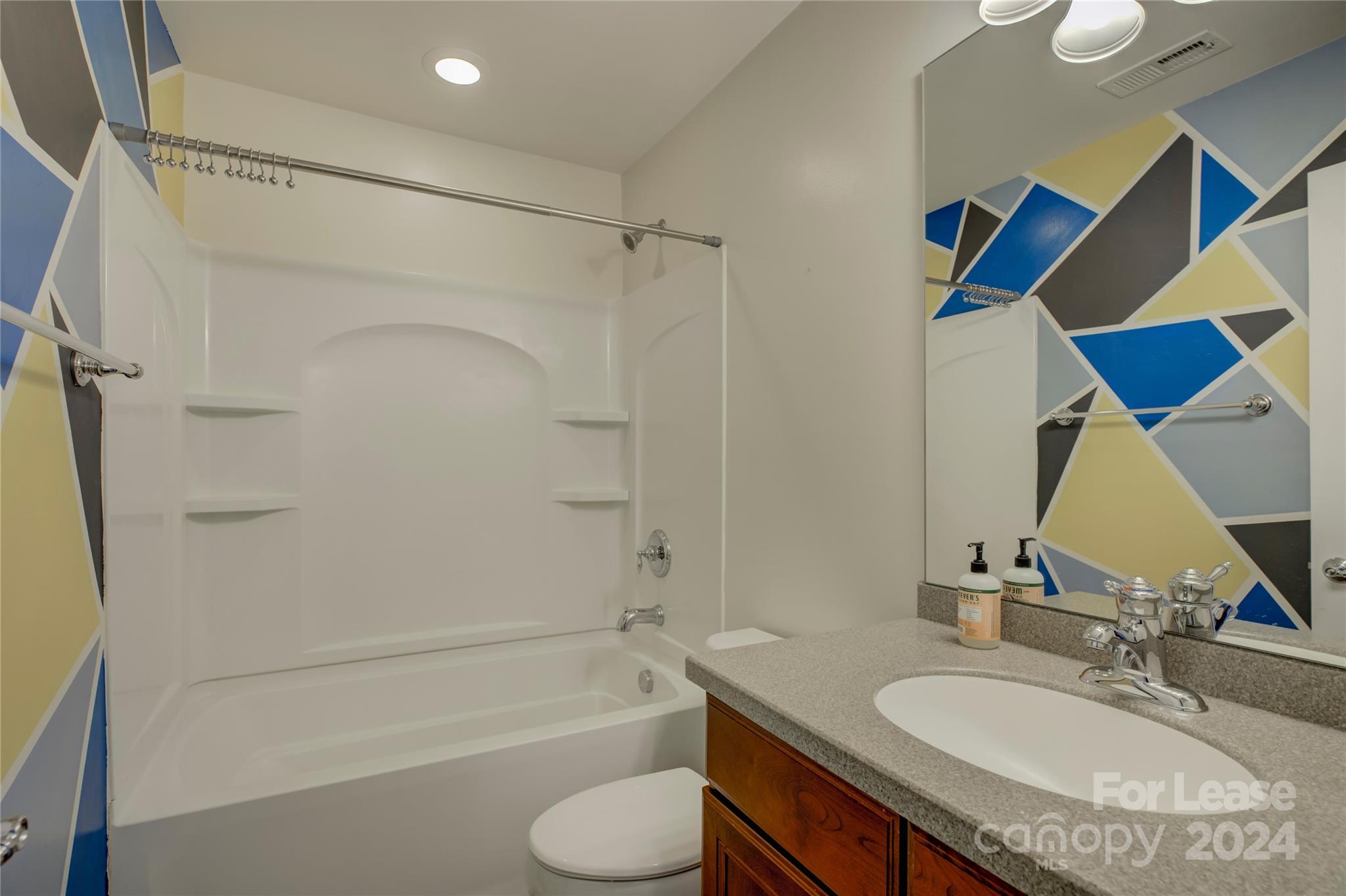 568 6th Baxter Crossing Fort Mill, SC 29708 - Photo 35 of 48 a bathroom with a granite countertop sink toilet and shower