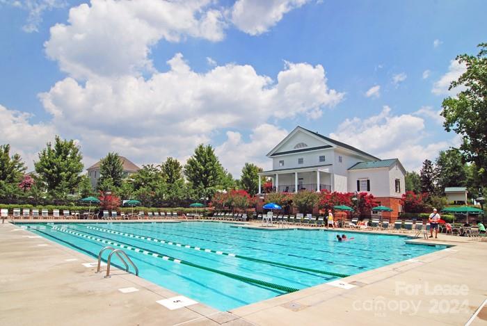 568 6th Baxter Crossing Fort Mill, SC 29708 - Photo 42 of 48 a front view of a house with garden