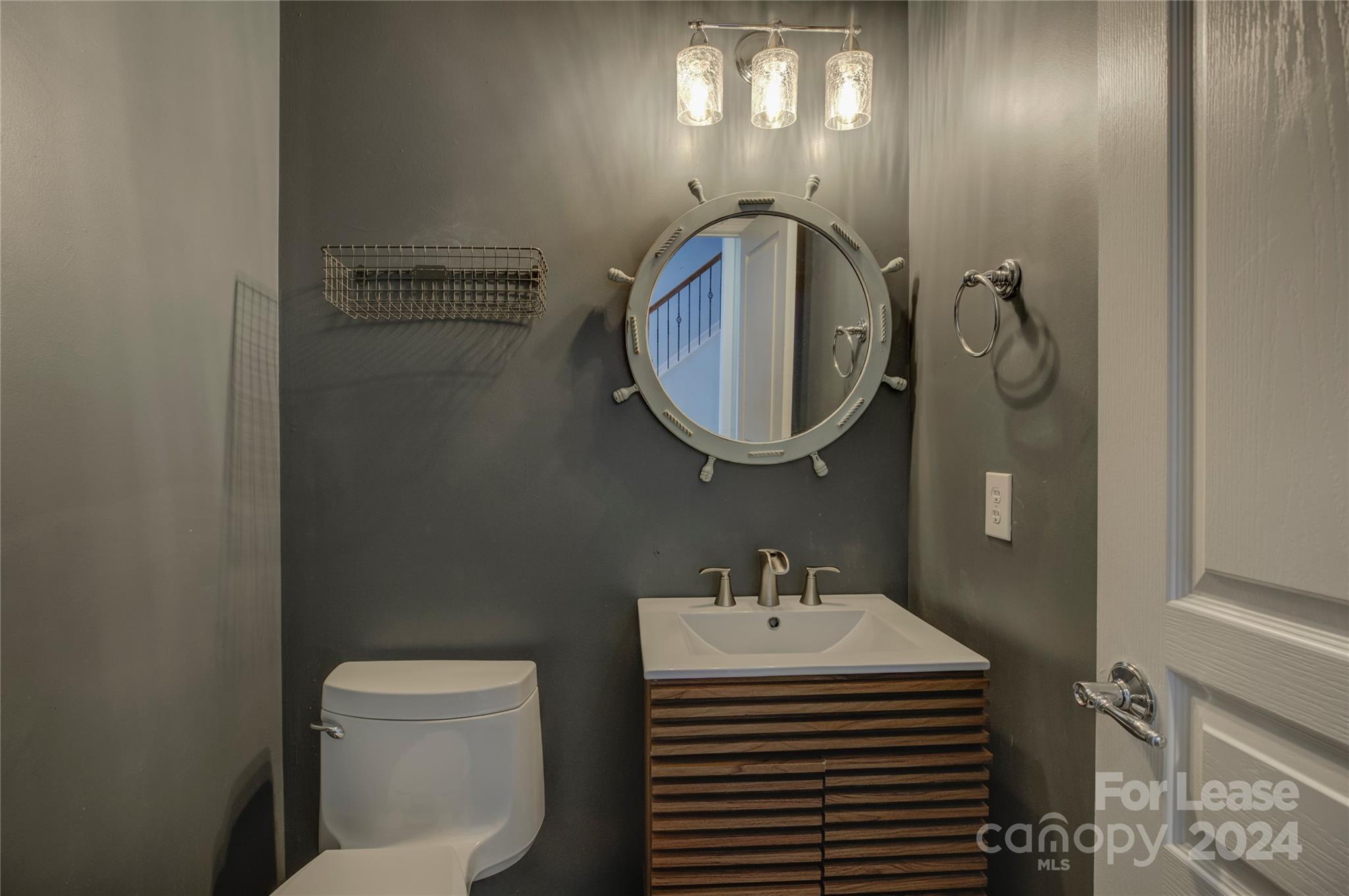568 6th Baxter Crossing Fort Mill, SC 29708 - Photo 9 of 48 a bathroom with a sink a toilet and mirror