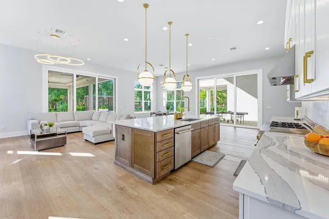 a bathroom with a sink a vanity and a mirror