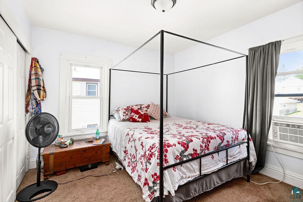 23 5th Street Proctor, MN 55810 - Photo 20 of 32 Bedroom featuring cooling unit and carpet