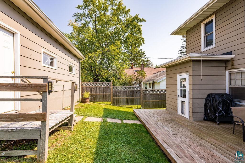 23 5th Street Proctor, MN 55810 - Photo 30 of 32 View of yard with a wooden deck