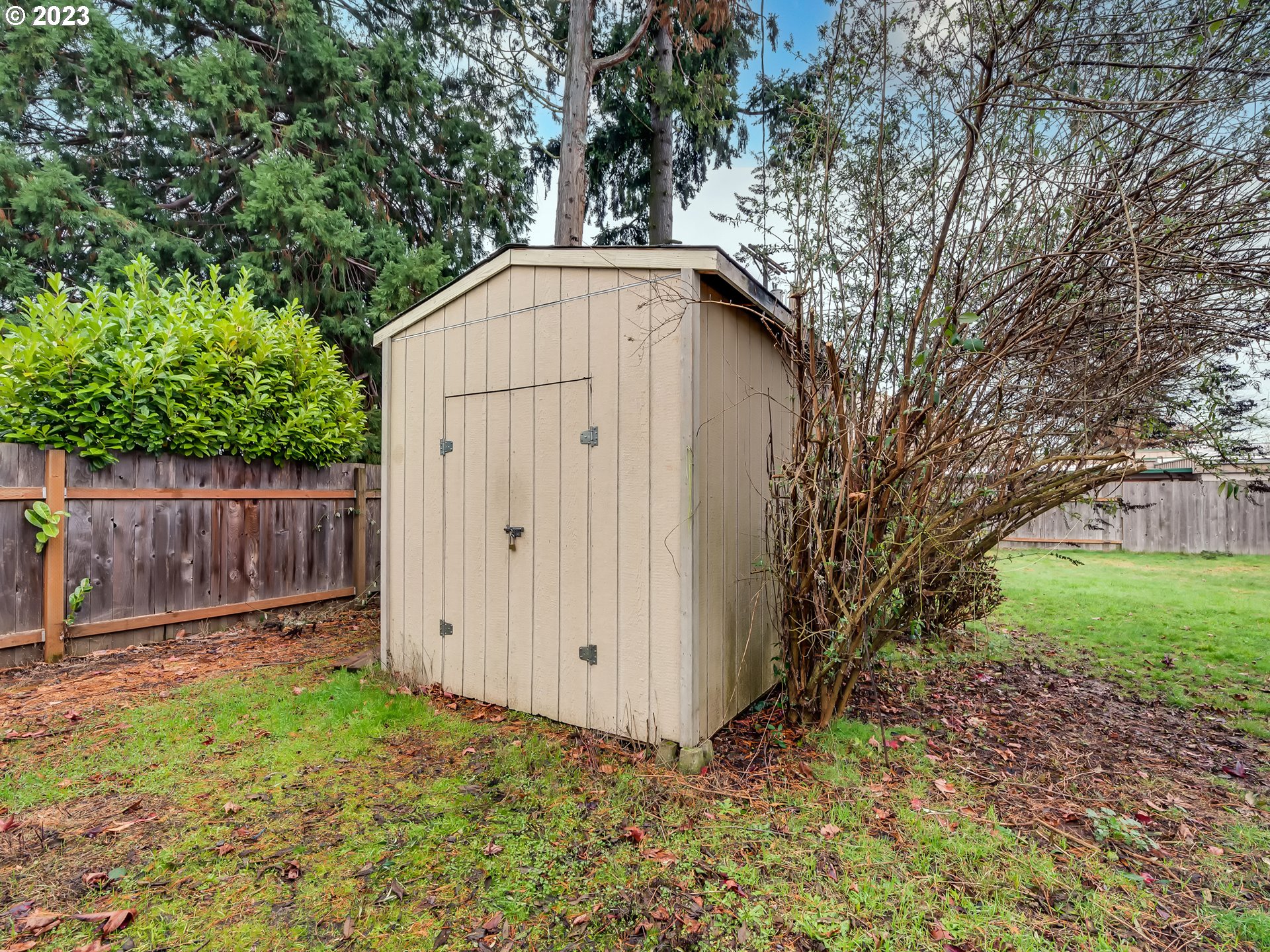 1138 F Street Springfield, OR 97477 - Photo 30 of 30 a view of backyard with wooden fence