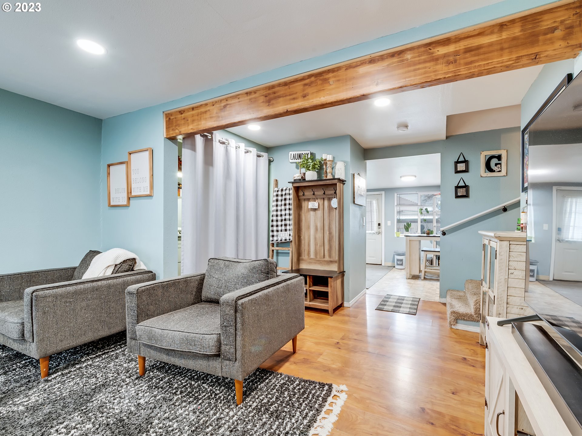 1138 F Street Springfield, OR 97477 - Photo 7 of 30 a living room with furniture and a wooden floor