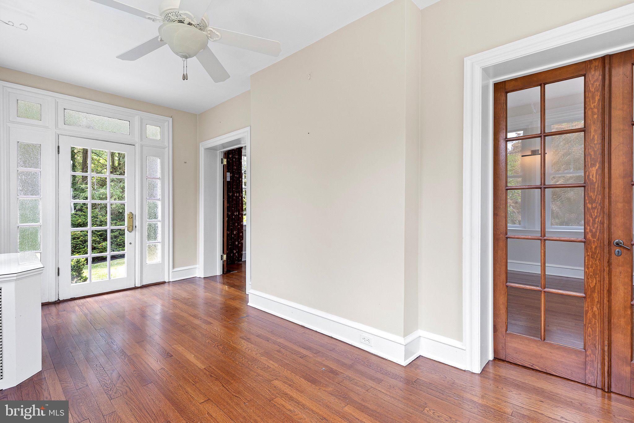 809 Shipley Road Wilmington, DE 19803 - Photo 19 of 51 Two sets of doors connect the living and sunrooms