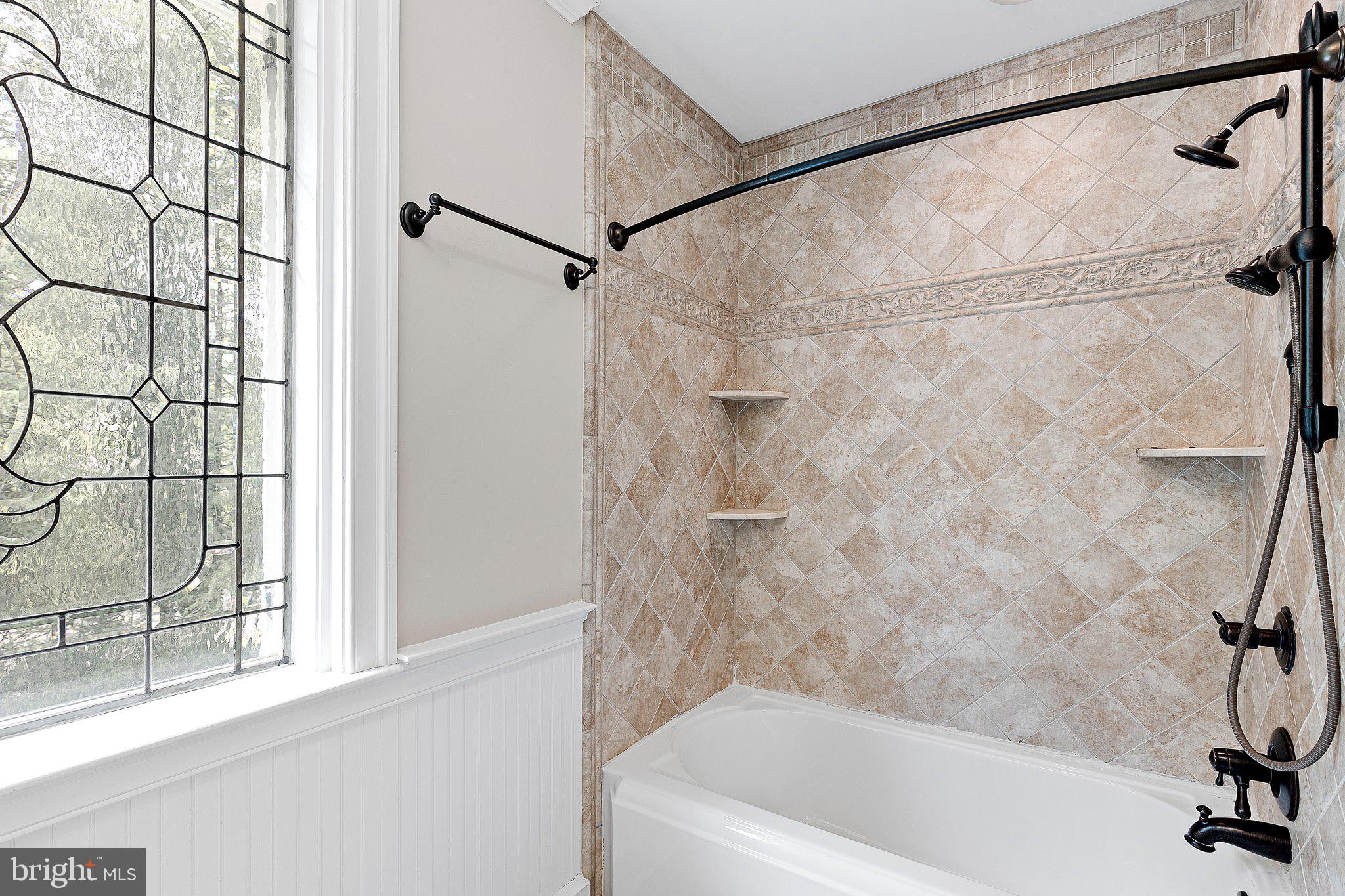 809 Shipley Road Wilmington, DE 19803 - Photo 34 of 51 Beautiful tile in the shower/tub combination