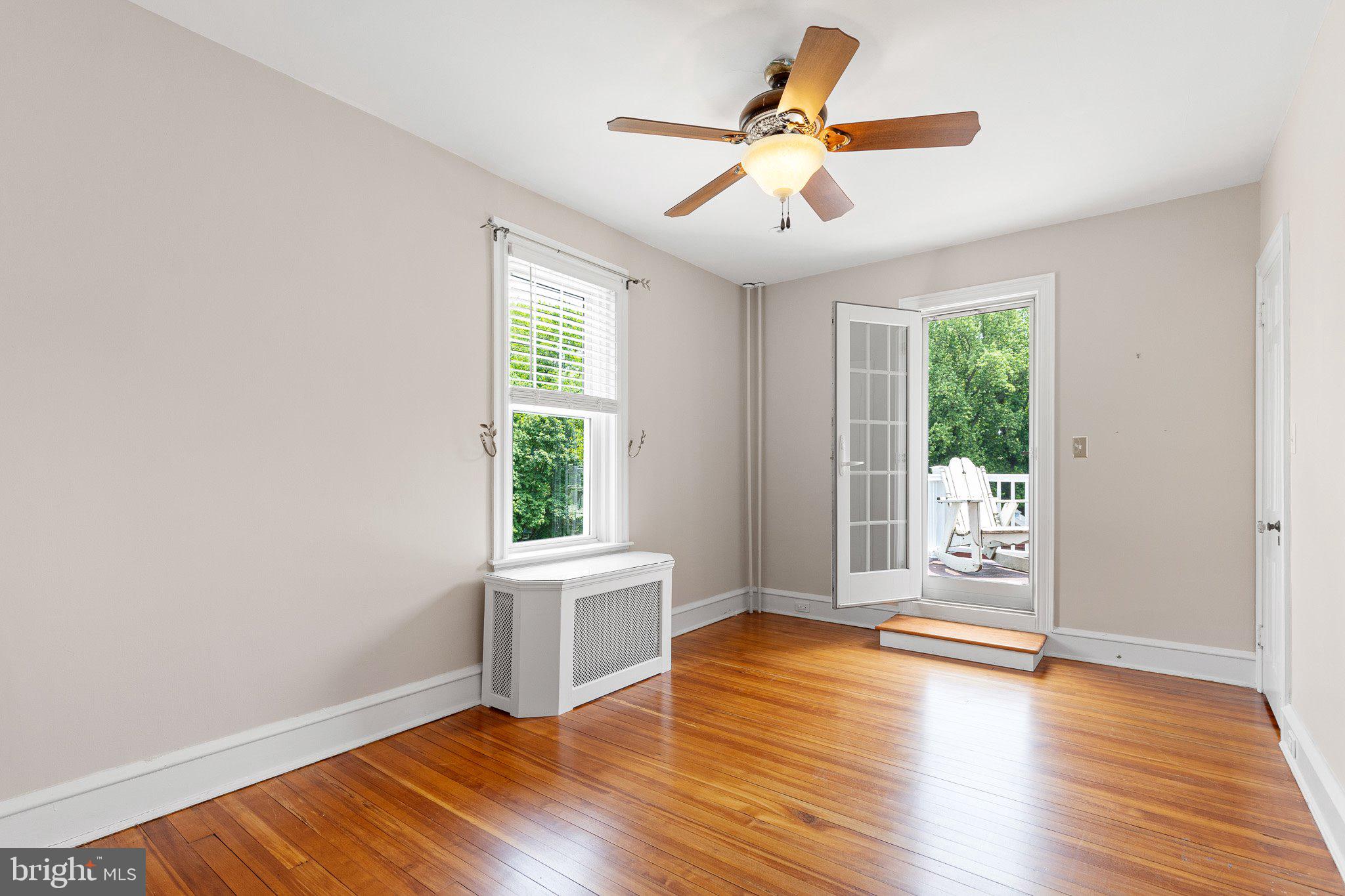 809 Shipley Road Wilmington, DE 19803 - Photo 36 of 51 Bedroom 3 with door to 2nd floor deck