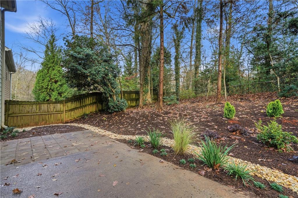 404 Sheila Way Canton, GA 30114 - Photo 21 of 36 a view of a backyard