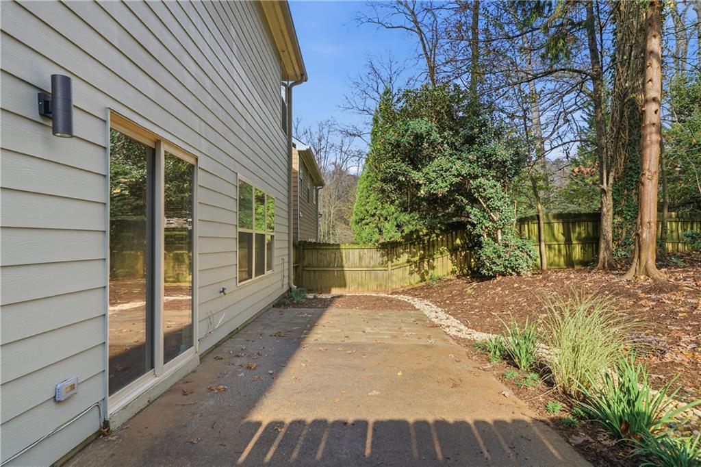 404 Sheila Way Canton, GA 30114 - Photo 29 of 36 a view of a backyard with plants