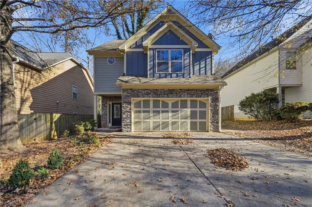 404 Sheila Way Canton, GA 30114 - Photo 31 of 36 a front view of a house with a yard