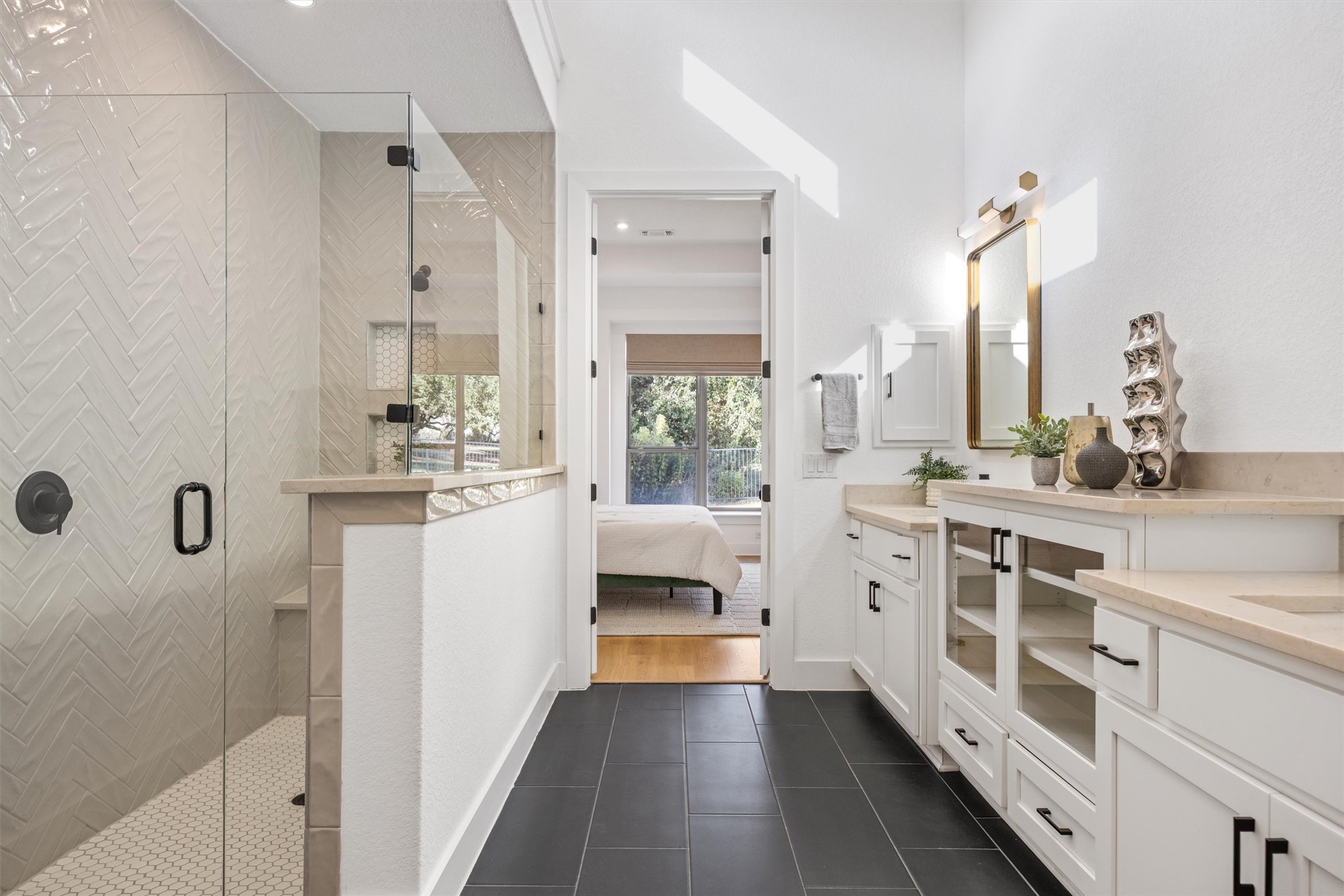 1122 Silver Dollar Trail Georgetown, TX 78628 - Photo 24 of 35 a bathroom with a double vanity sink a mirror and shower