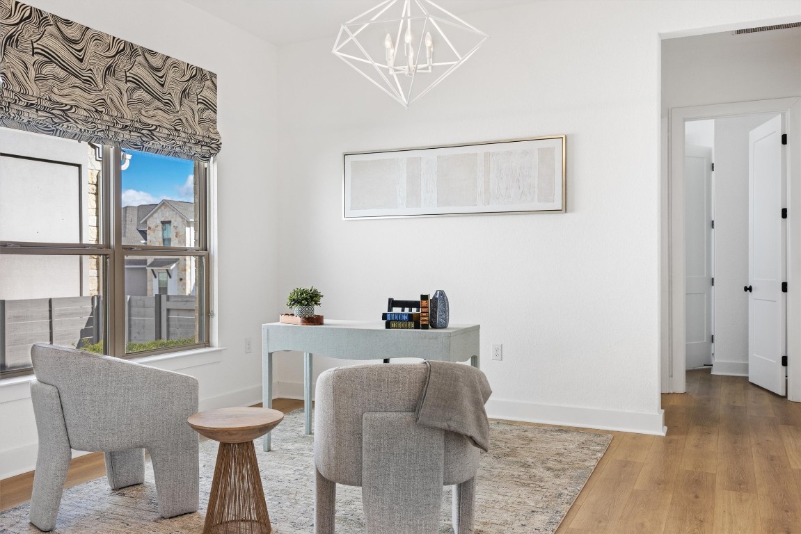 1122 Silver Dollar Trail Georgetown, TX 78628 - Photo 7 of 35 a living room with furniture and a window