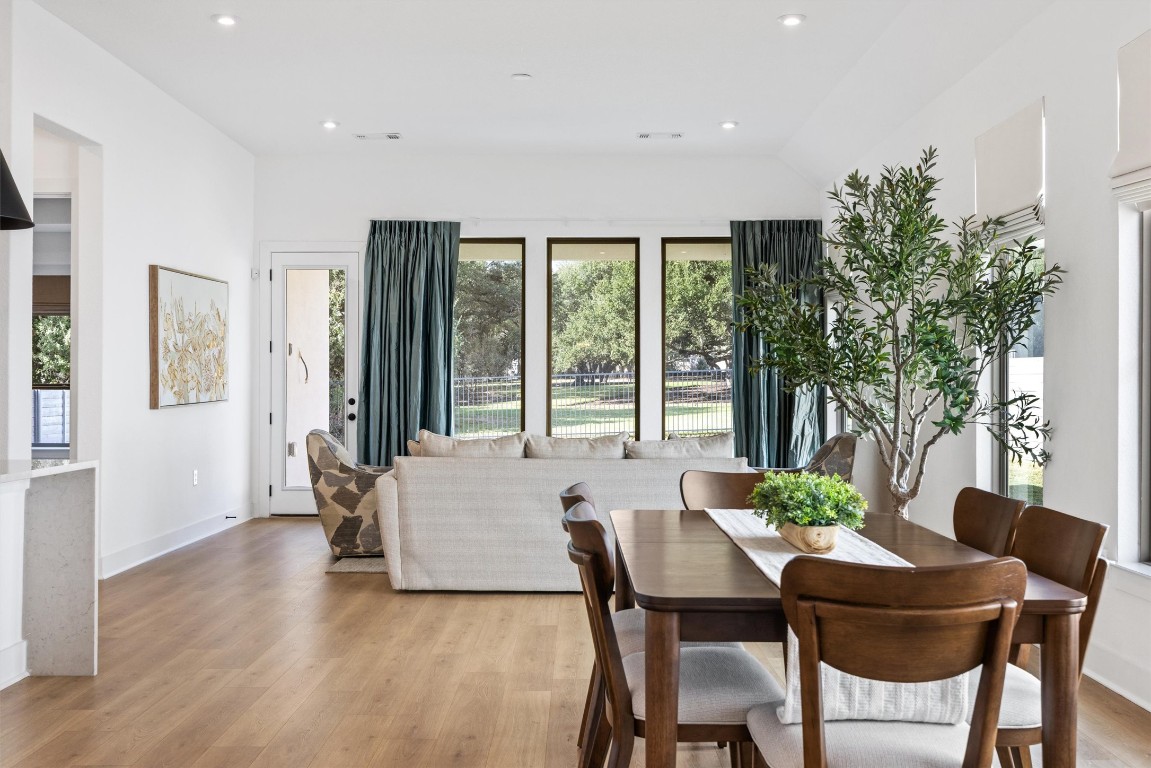 1122 Silver Dollar Trail Georgetown, TX 78628 - Photo 8 of 35 a view of a dining room with furniture and window