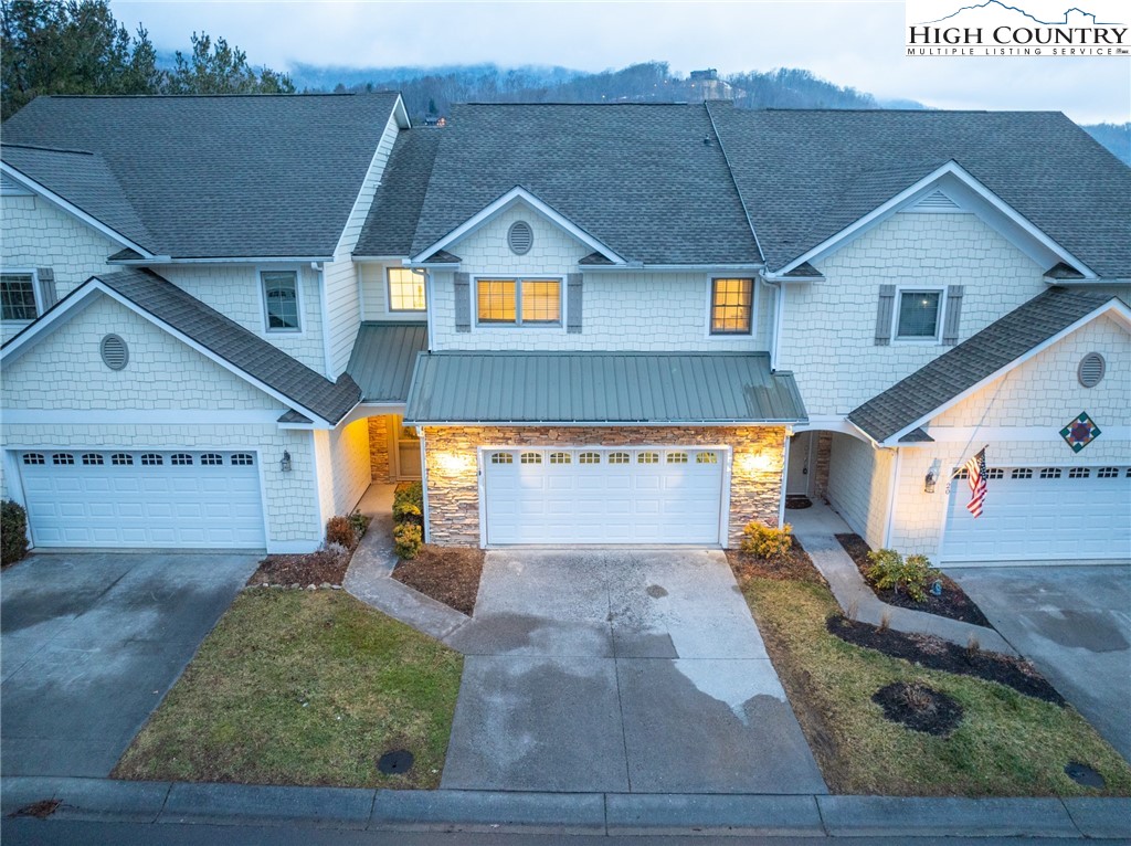 114 Charles Lowe Lane, Unit 19 Banner Elk, NC 28604 - Photo 37 of 38 a view of a house with a outdoor space
