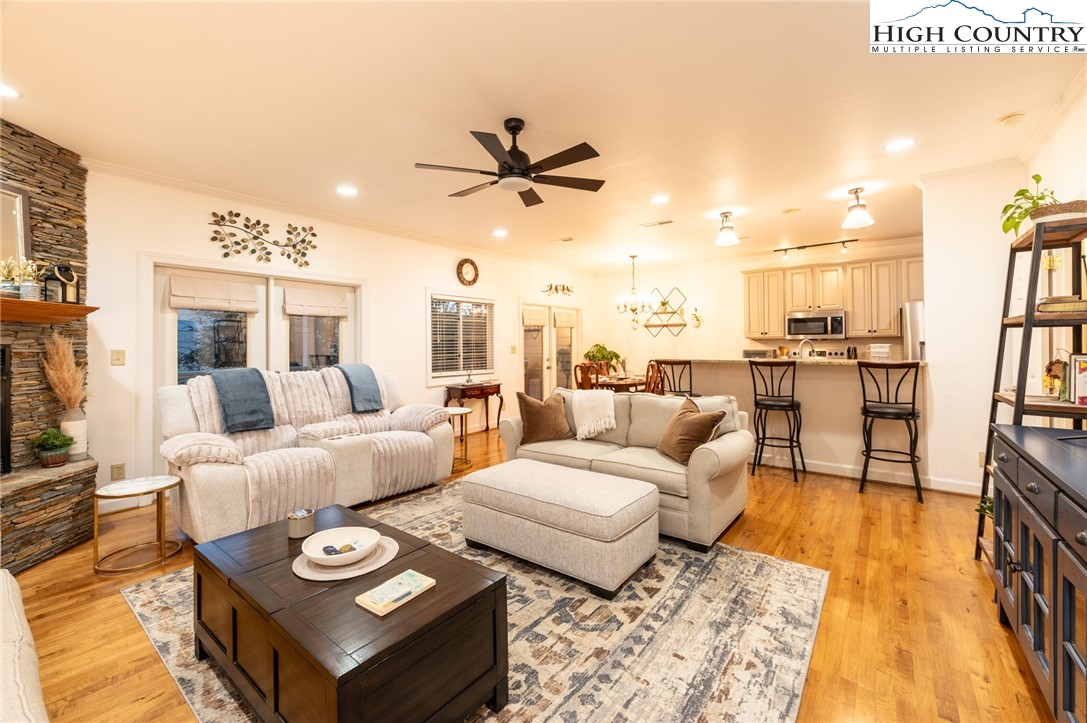 114 Charles Lowe Lane, Unit 19 Banner Elk, NC 28604 - Photo 7 of 38 a living room with furniture and a large window