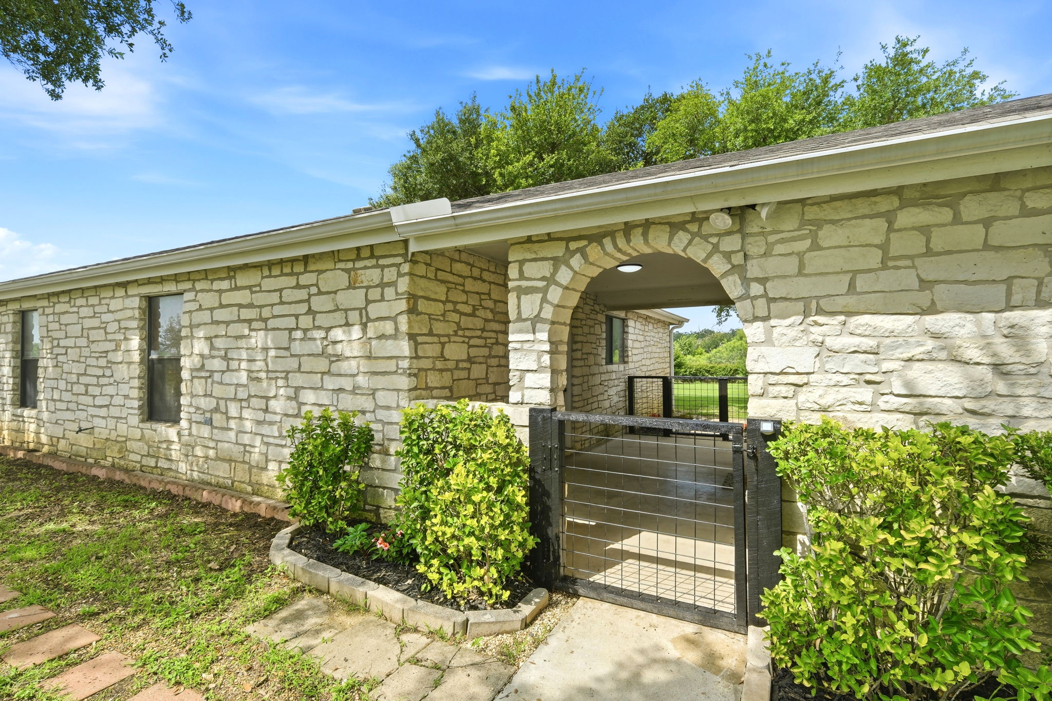 900 County Road 474 Elgin, TX 78621 - Photo 23 of 36 Covered Breezeway between Garage and House