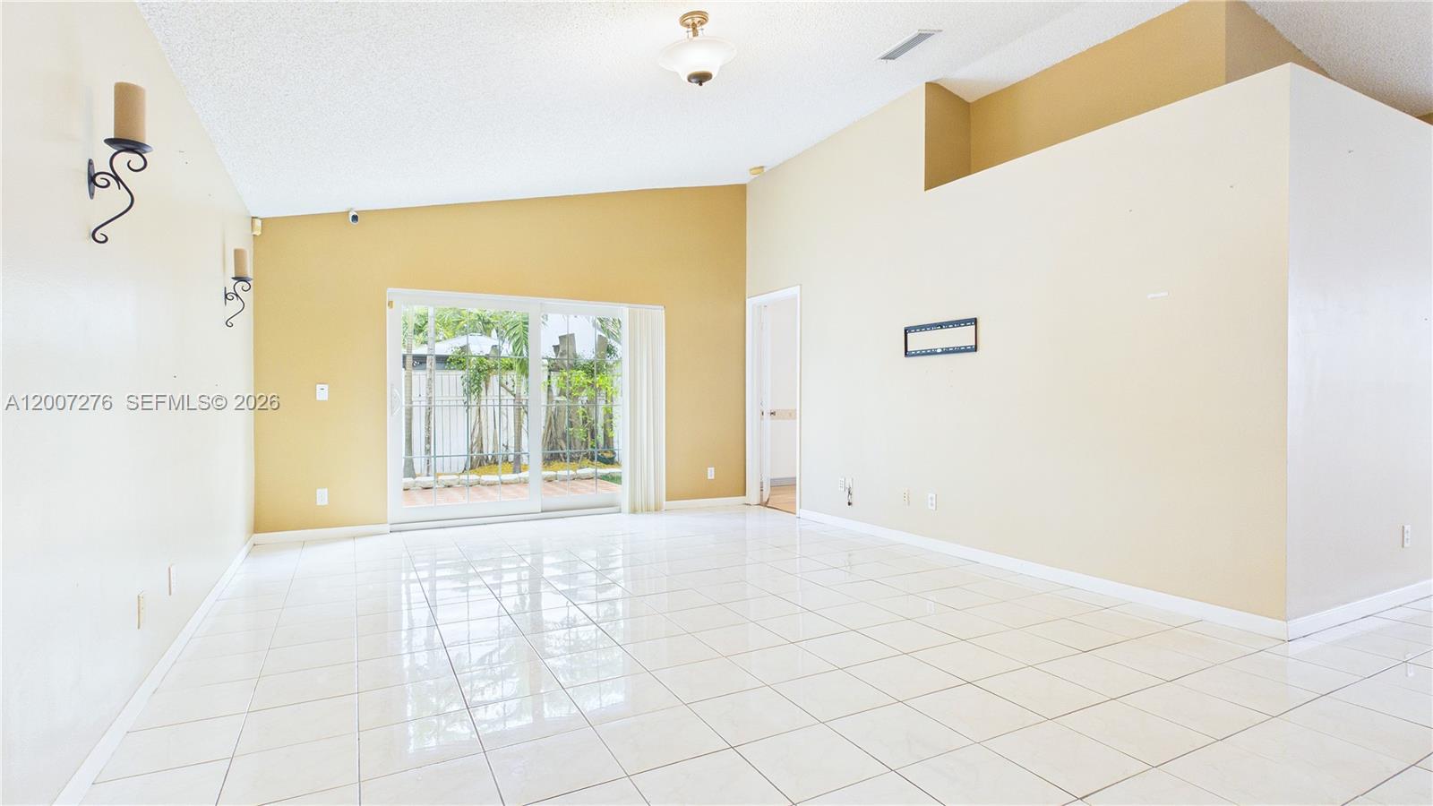 17626 Southwest 20th Street Miramar, FL 33029 - Photo 16 of 27 a view of an empty room with a window