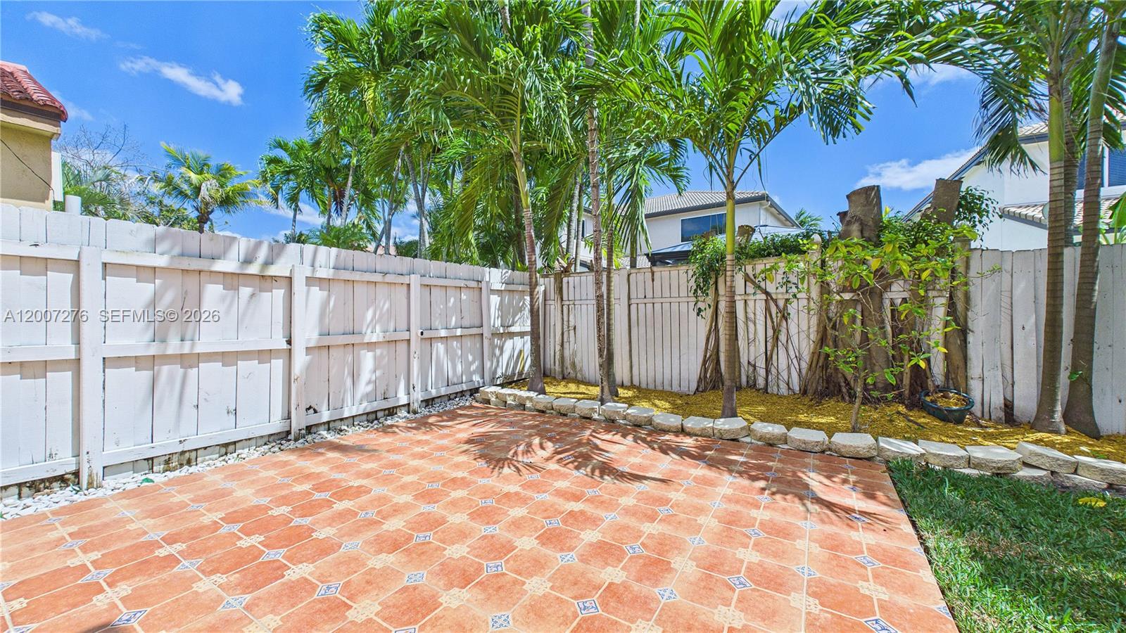 17626 Southwest 20th Street Miramar, FL 33029 - Photo 21 of 27 a view of a backyard with a trees