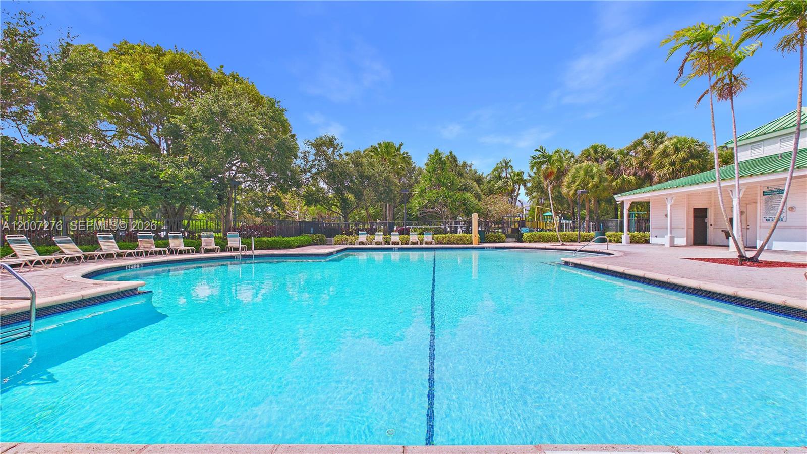 17626 Southwest 20th Street Miramar, FL 33029 - Photo 23 of 27 a view of a house with swimming pool