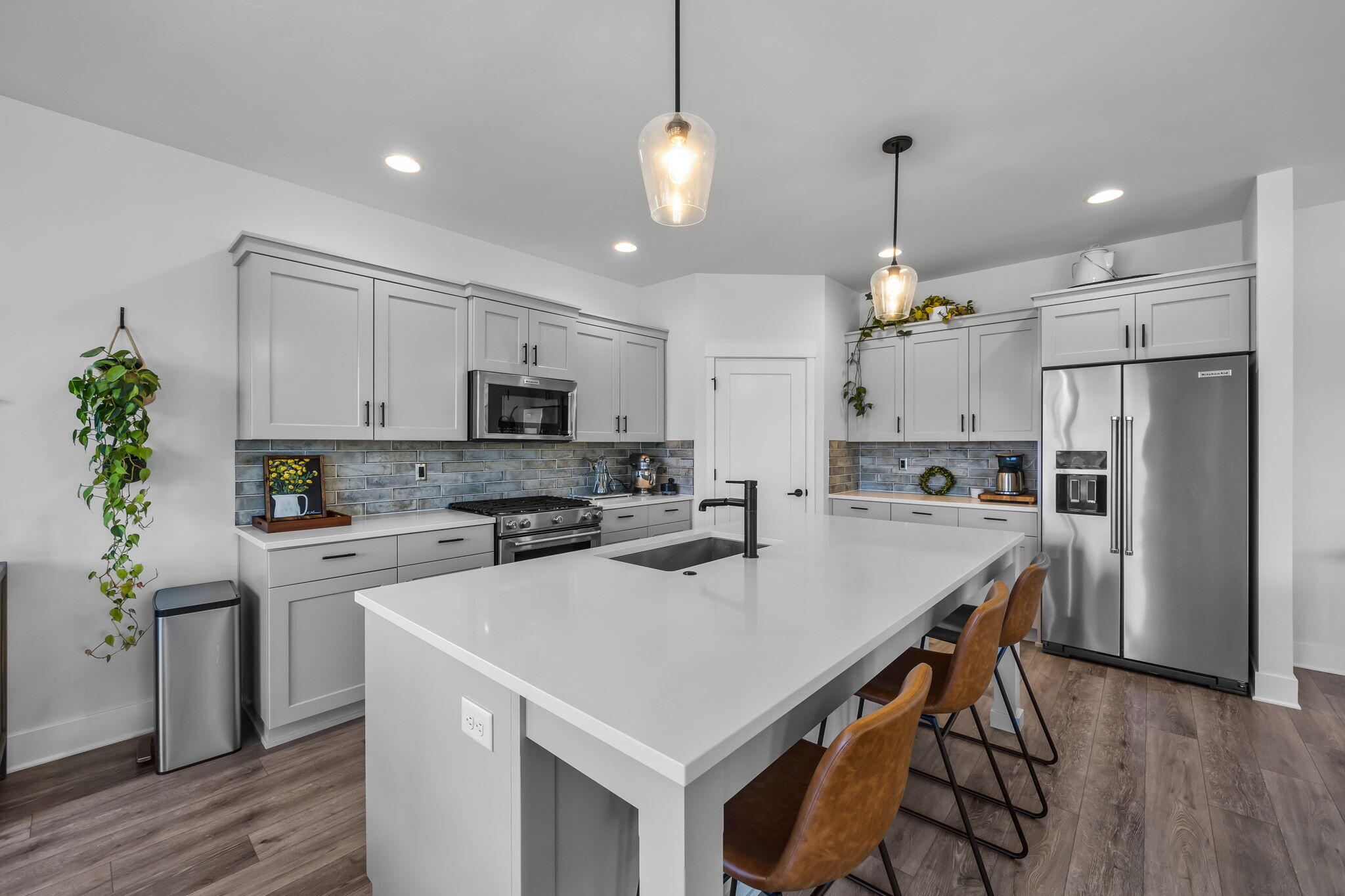4361 Southwest 36th Street Redmond, OR 97756 - Photo 7 of 34 Chef-inspired kitchen w/quartz island, pantry & abundant cabinetry.