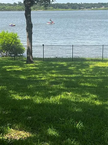 a view of a garden and lake