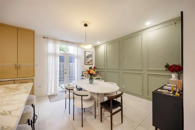 a view of a room with wooden floor and cabinet