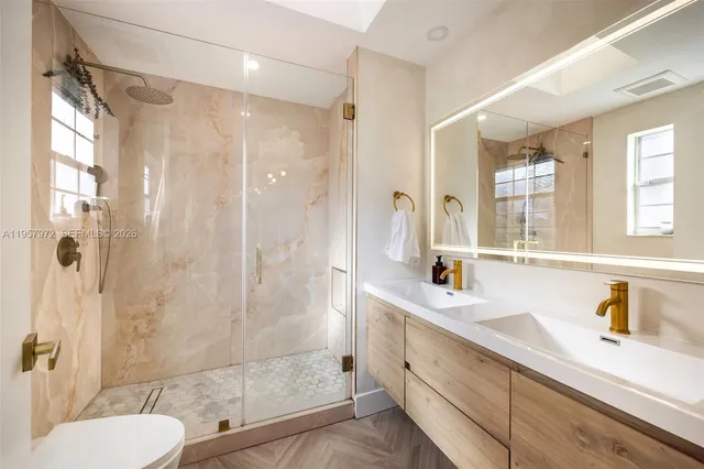 a bathroom with a bathtub and toilet