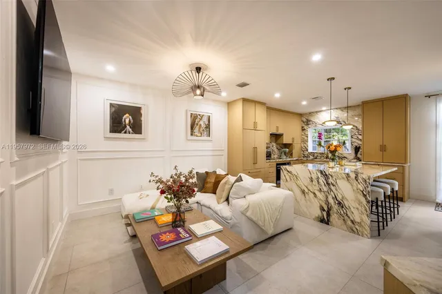 a bathroom with a double vanity sink toilet and shower