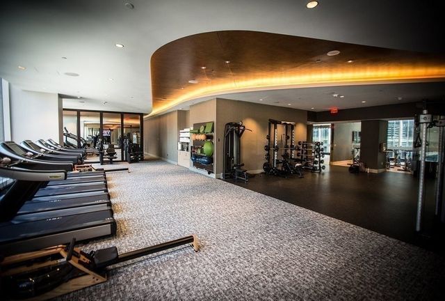 a view of a lobby with black carpet
