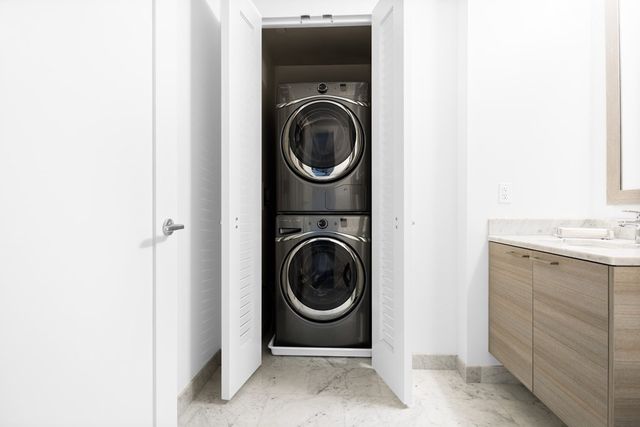 a utility room with dryer and washer