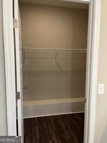 a view of small space with racks on the wall