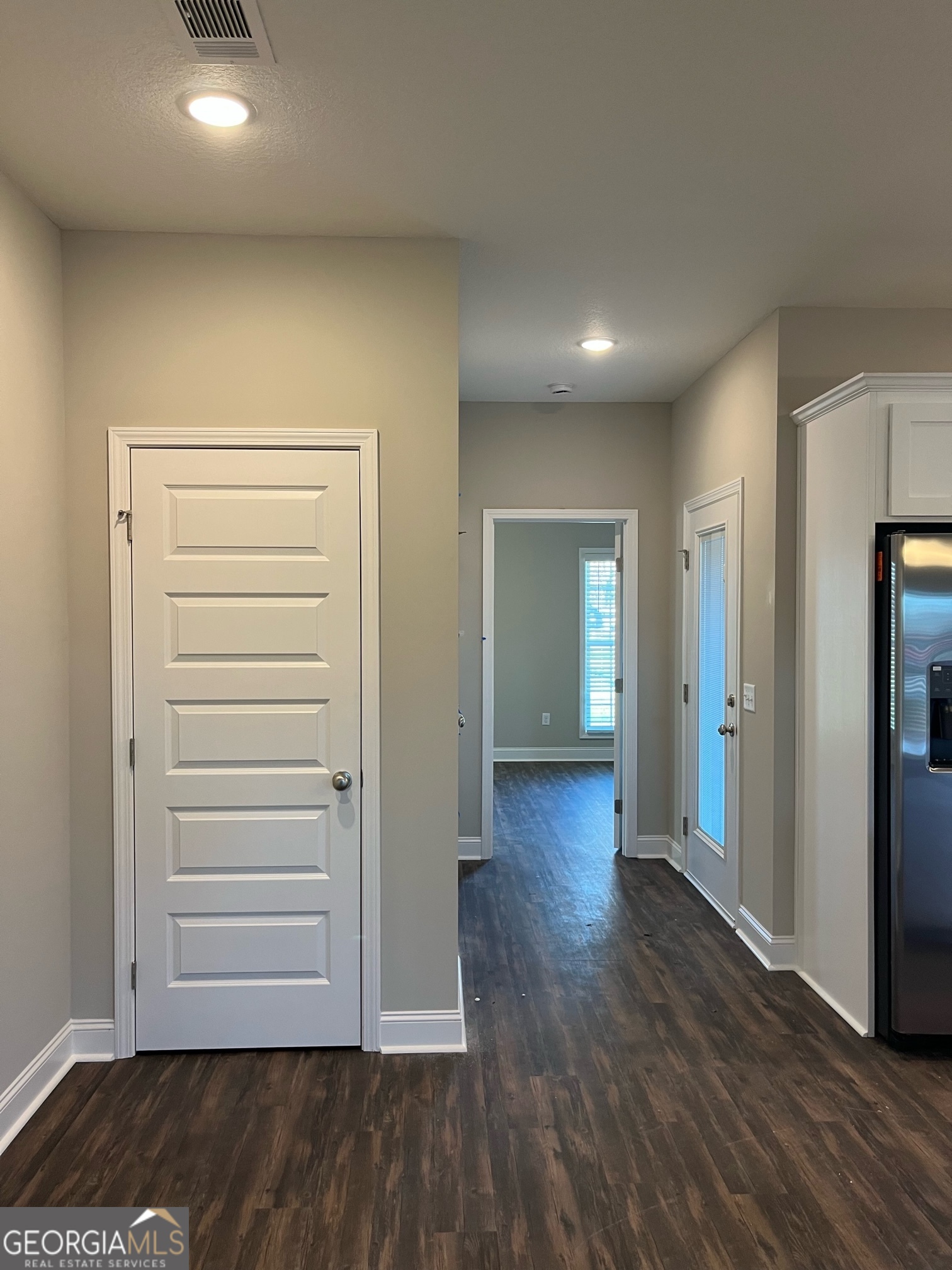 127 Orchard Way Brooklet, GA 30415 - Photo 5 of 15 wooden floor in an empty room with wooden floor
