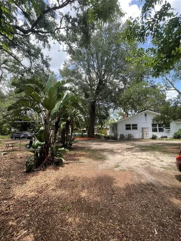 a view of a car park in front of house