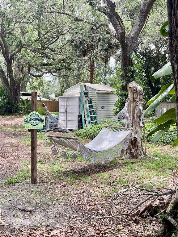 578 3rd Street Daytona Beach, FL 32117 - Photo 50 of 88 a front view of a house with garden