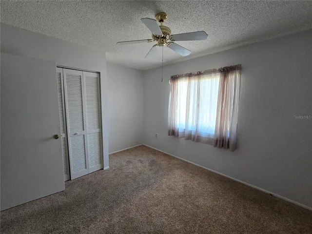 an empty room that has a window