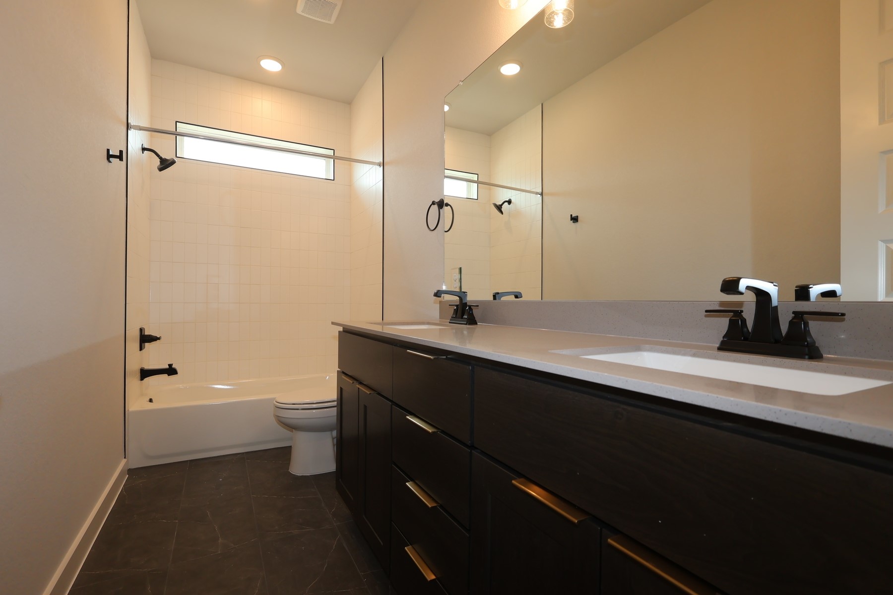 436 Leaning Rock Road Georgetown, TX 78628 - Photo 11 of 22 a bathroom with a sink a toilet and shower