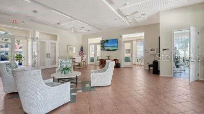 a view of a chairs and table in the patio