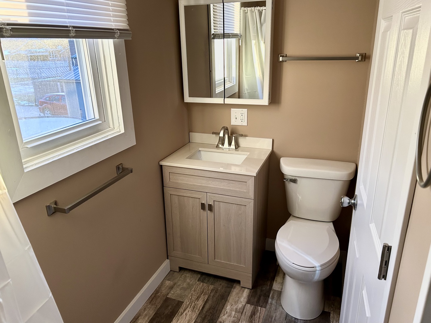 444 6th Street LaSalle, IL 61301 - Photo 4 of 11 a bathroom with a toilet sink and mirror