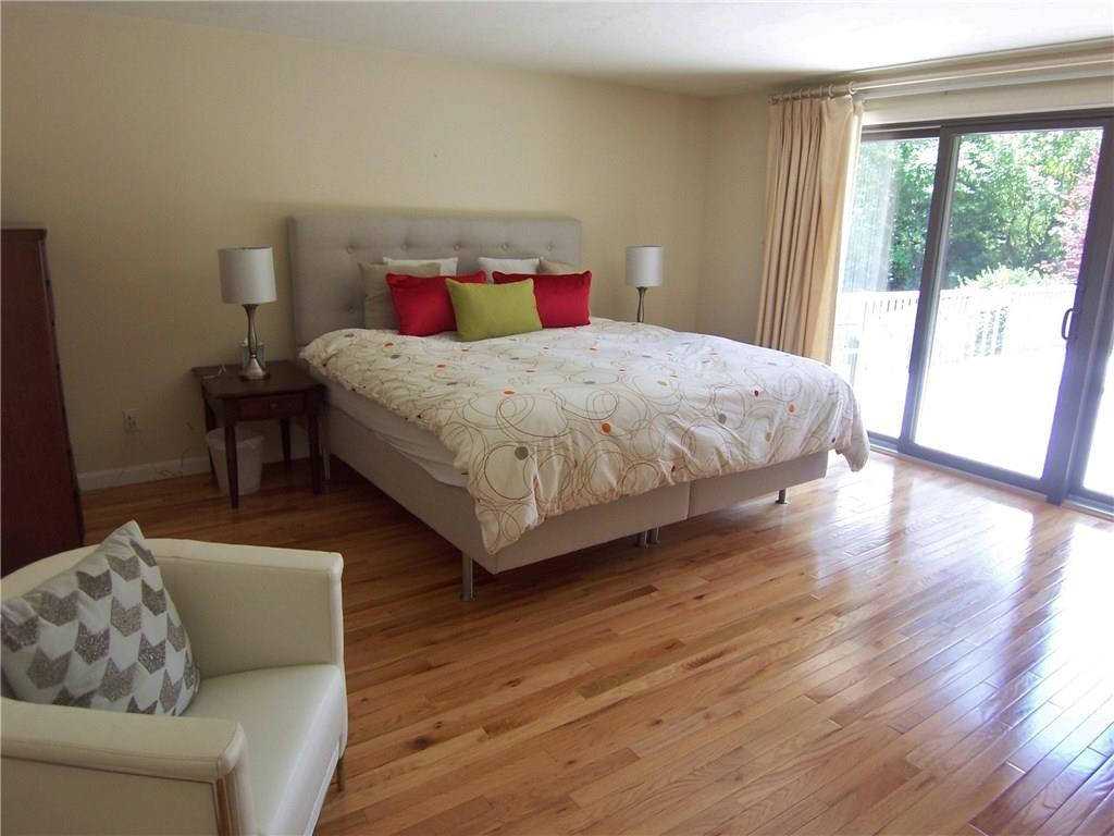 1755 Partridge Run Road Pittsburgh, PA 15241 - Photo 12 of 25 Master bedroom will easily hold your king sized furniture. All the hardwood flooring in the home has been refinished. And you have the added bonus of a new sliding door out to the deck for late night star gazing.