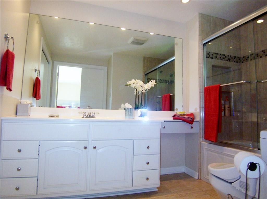 1755 Partridge Run Road Pittsburgh, PA 15241 - Photo 13 of 25 Enter the entirely remodeled master bath through double doors. New shower surround with decorative listello accents, new vanity. There is a double closet in this room, as well as in the master bedroom itself.