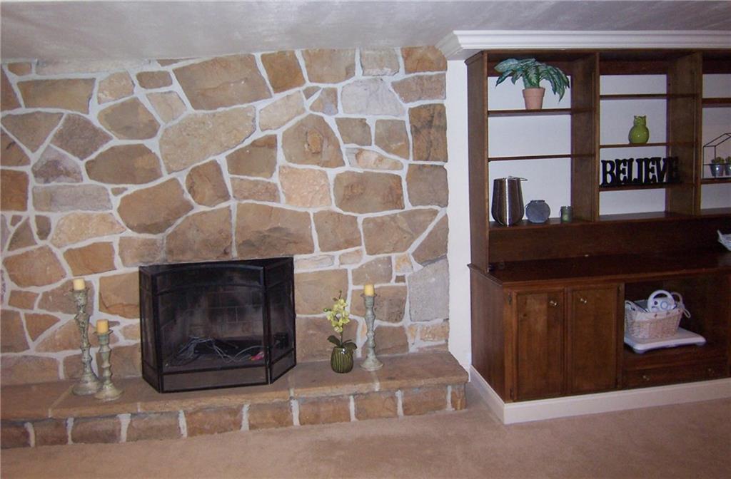 1755 Partridge Run Road Pittsburgh, PA 15241 - Photo 20 of 25 Beautiful stone fireplace provides a great accent wall, and a perfect place to hang out.