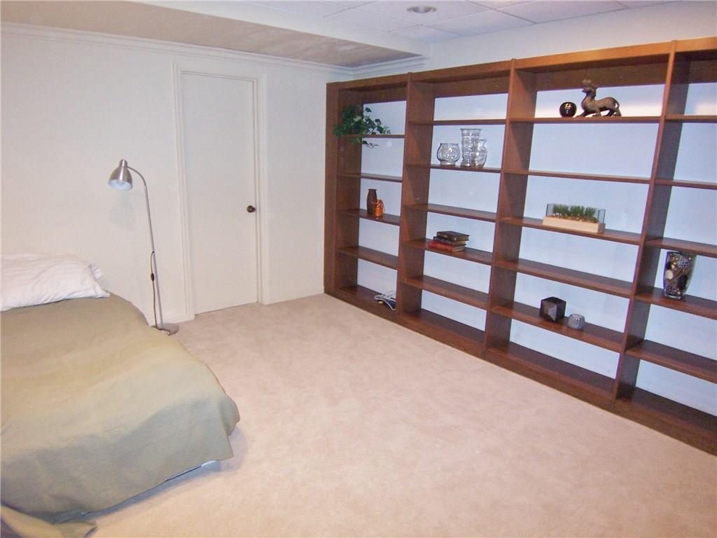 1755 Partridge Run Road Pittsburgh, PA 15241 - Photo 21 of 25 A fourth bedroom or office is on the lower level, and the door leads to an enormous closet/storage area. There is a full bath next door.