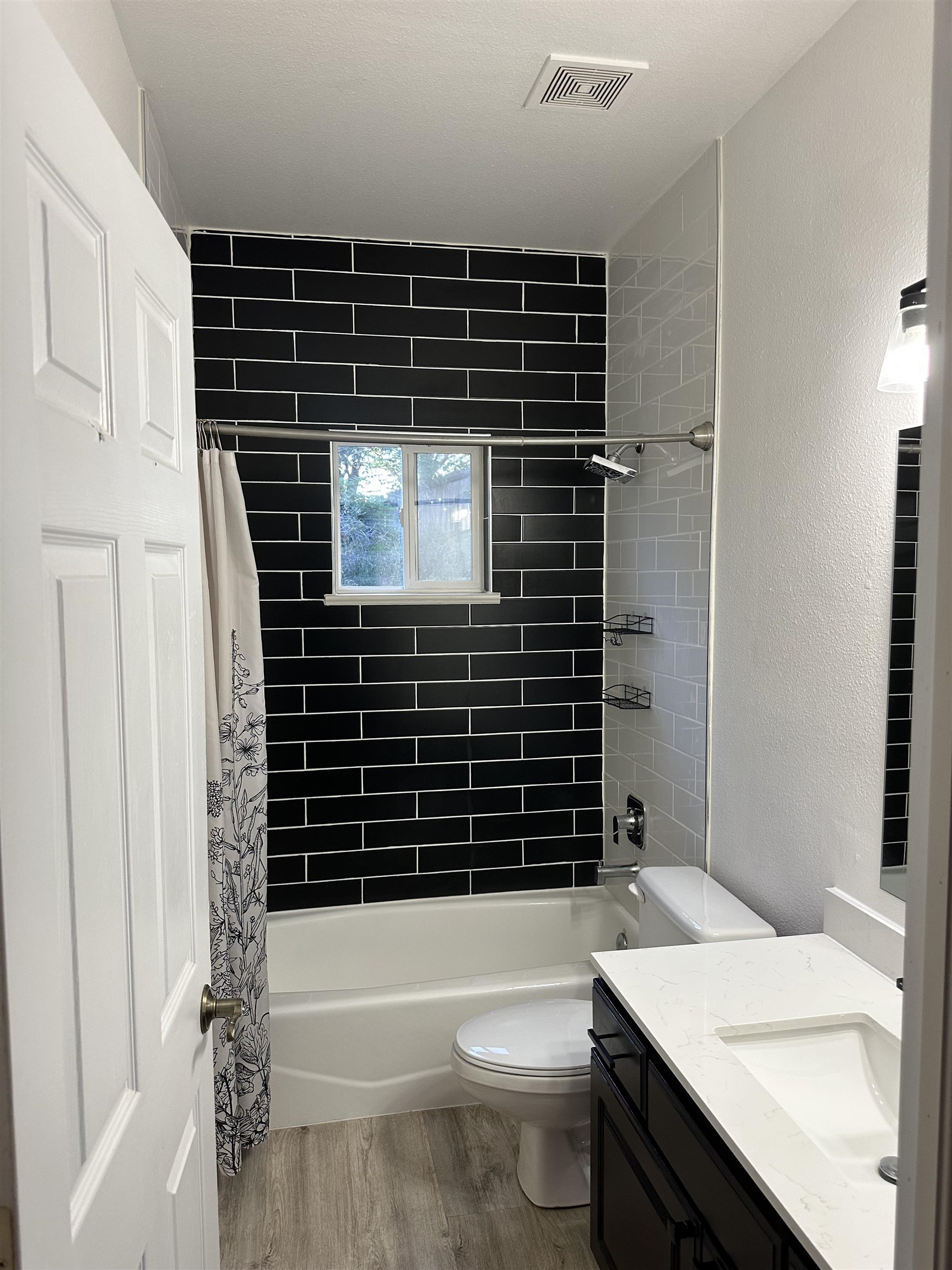 2678 Cambridge Road Grand Junction, CO 81506 - Photo 23 of 32 a bathroom with a sink a toilet and shower