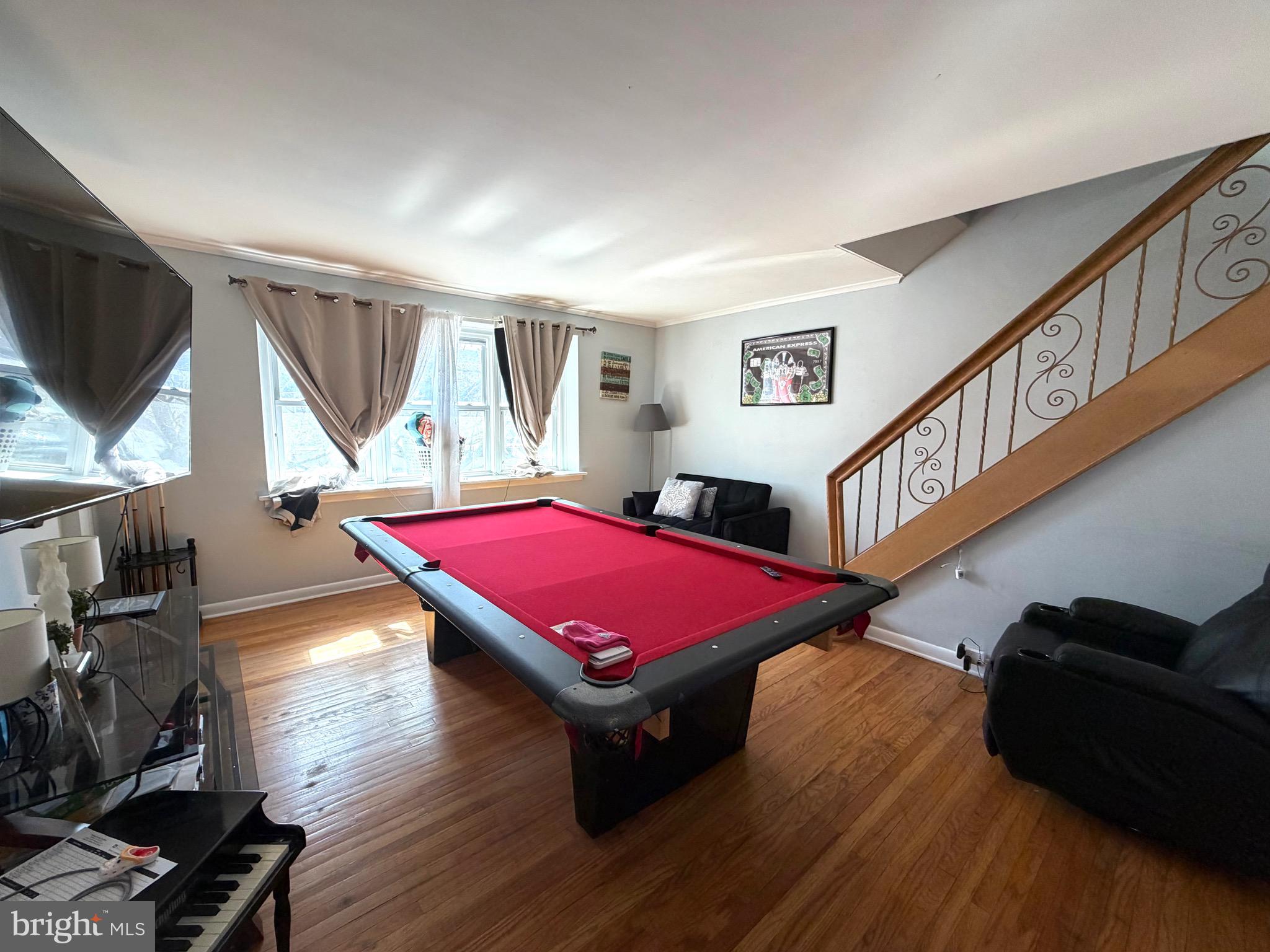 2019 Faunce Street Philadelphia, PA 19152 - Photo 2 of 10 a room with furniture pool table gym equipment wooden floor and window