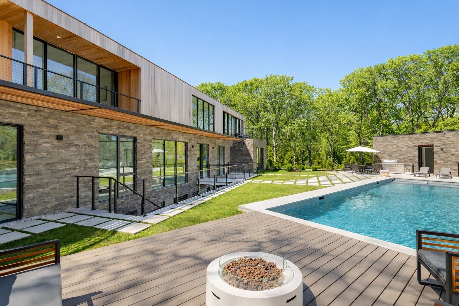 1694 Millstone Road Sag Harbor, NY 11963 - Photo 2 of 14 Saltwater Pool with Infinity Edge