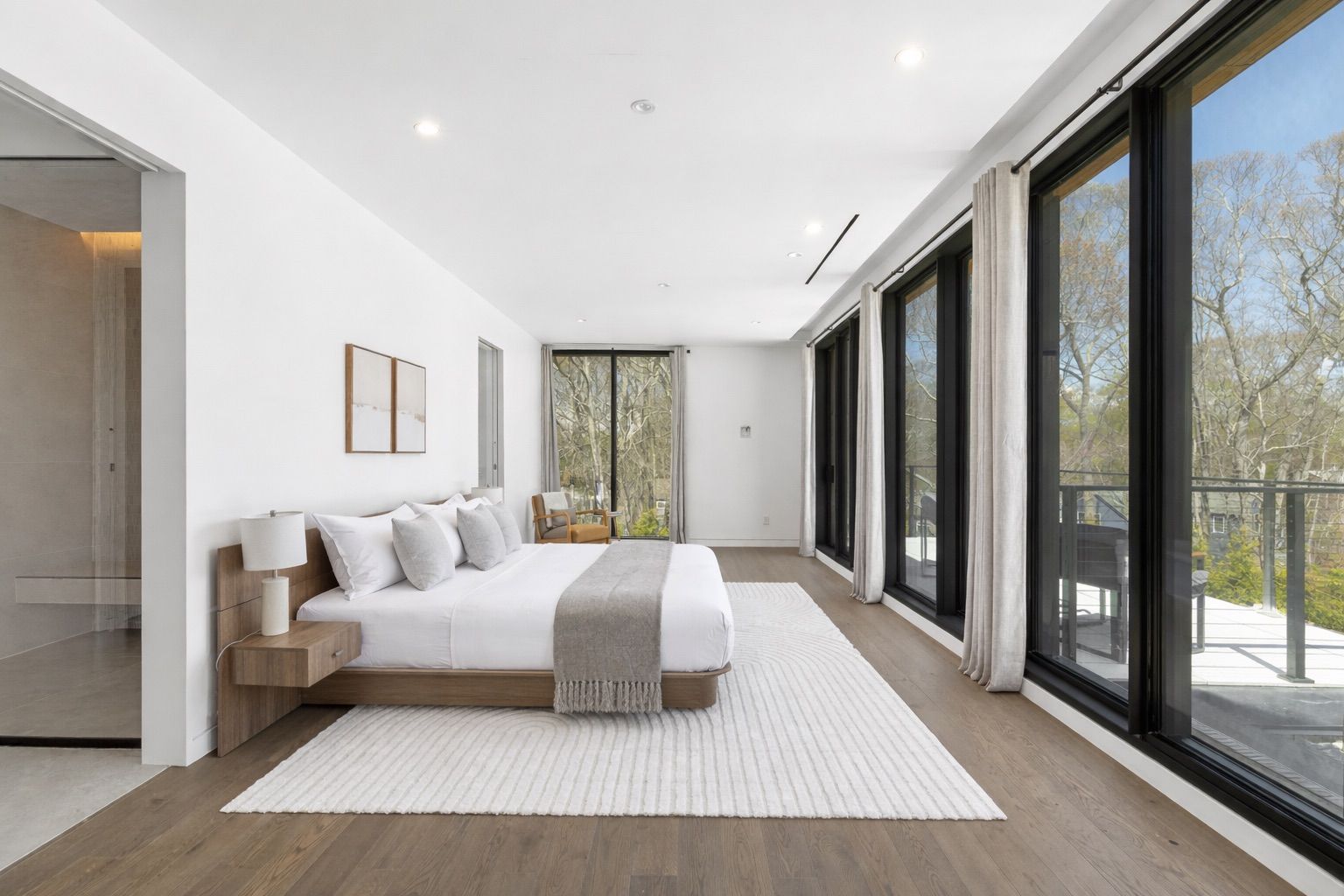 1694 Millstone Road Sag Harbor, NY 11963 - Photo 8 of 14 Primary Ensuite with Private Balcony