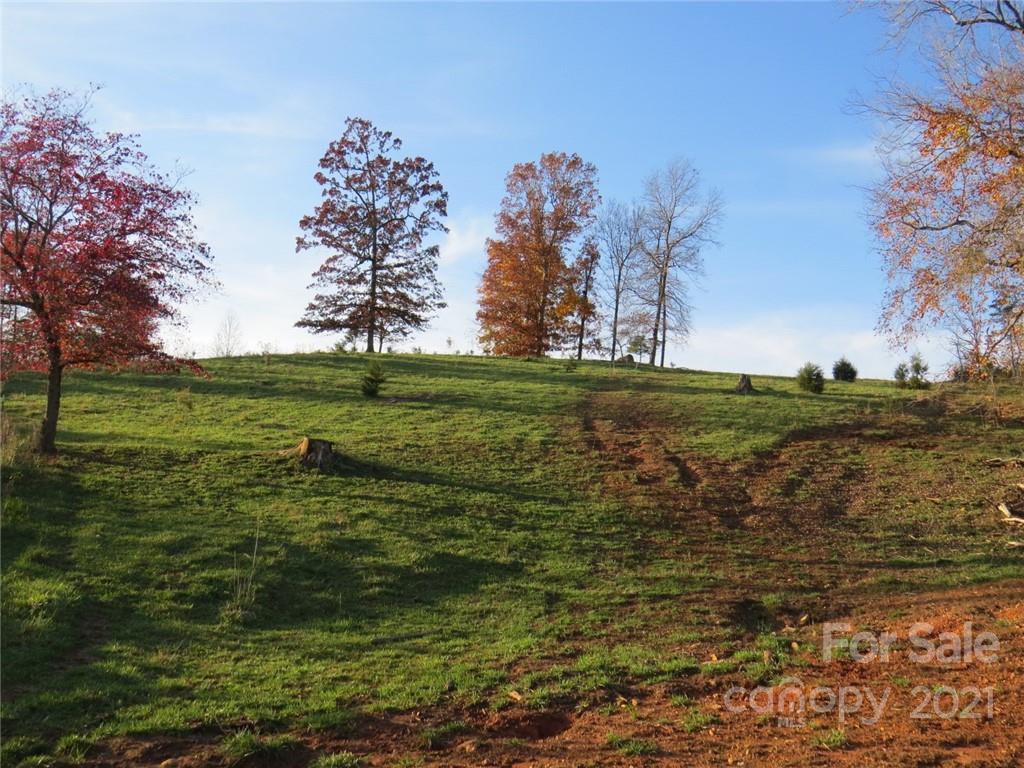926 Coolbrook Road Union Grove, NC 28689 - Photo 29 of 48 a large body of water with a building in background