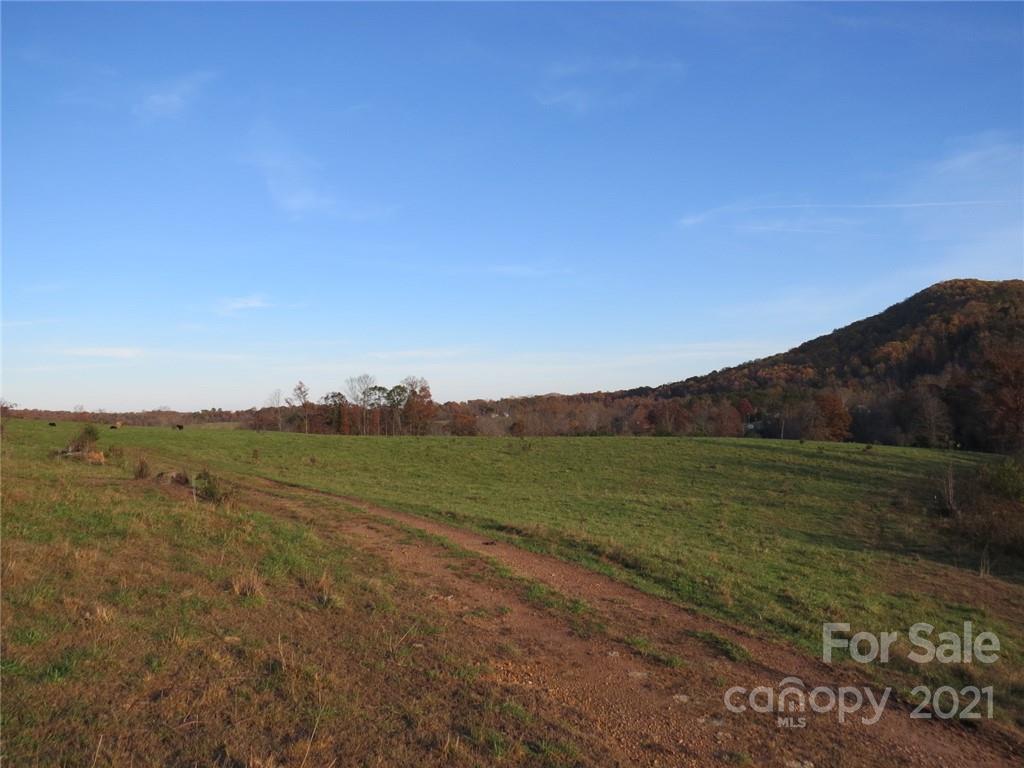926 Coolbrook Road Union Grove, NC 28689 - Photo 31 of 48 a view of a field with an ocean