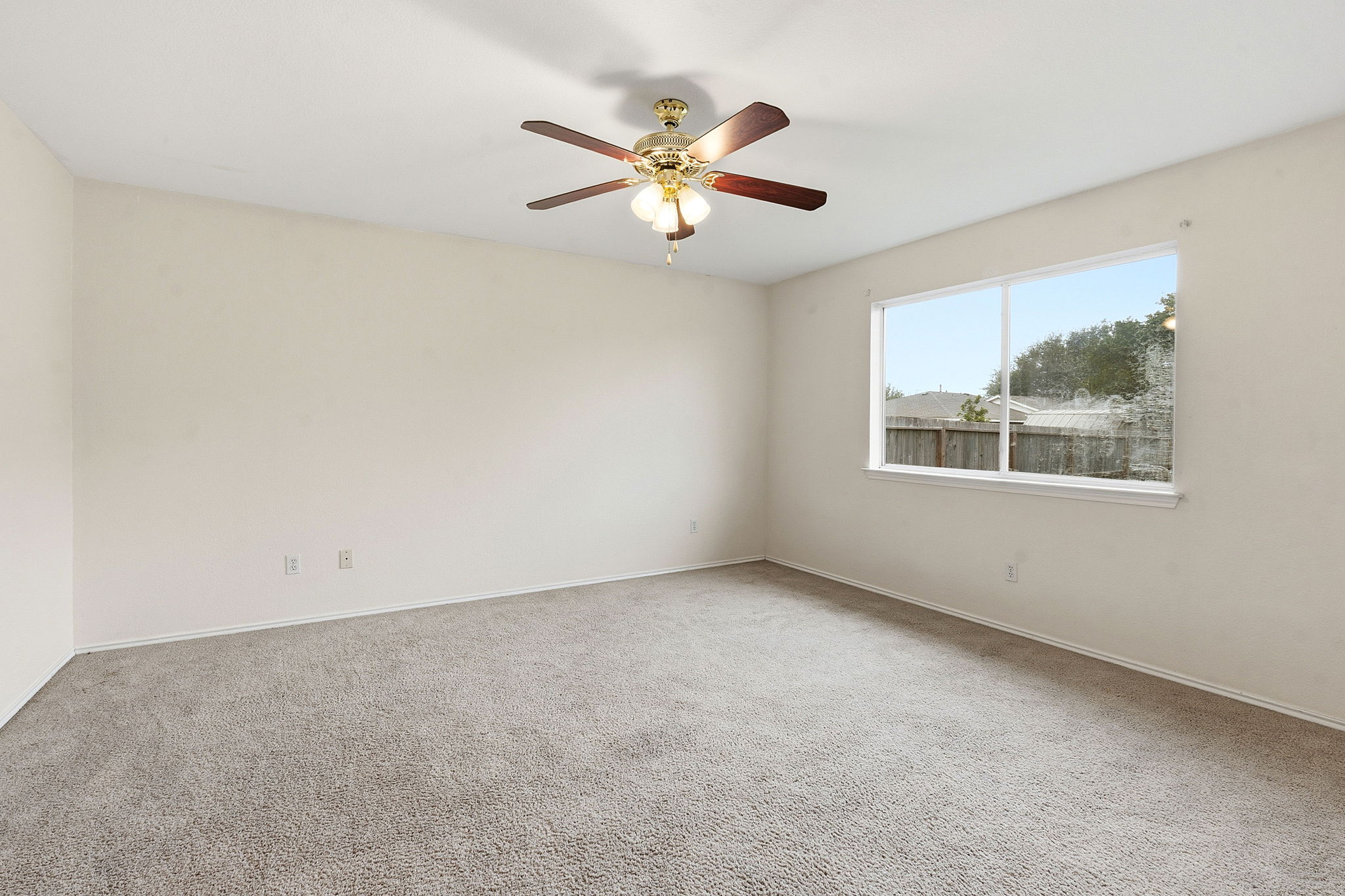 116 Blue Ridge Trail Elgin, TX 78621 - Photo 14 of 28 a view of an empty room with a window